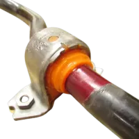 Stabilizer with welded bushings